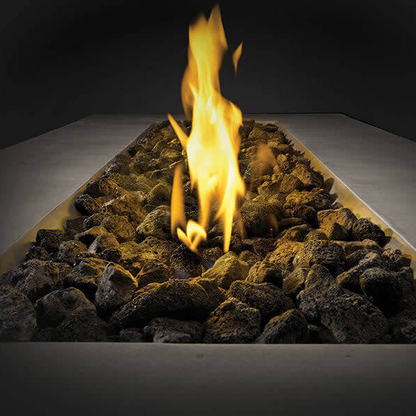 Fireplace with burning logs and flames on a dark background